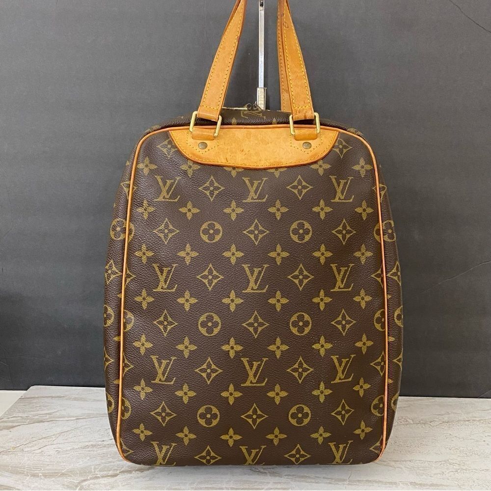 LOUIS VUITTON Monogram Excursion Handbag 👜
